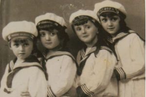 A black and white picture of four children