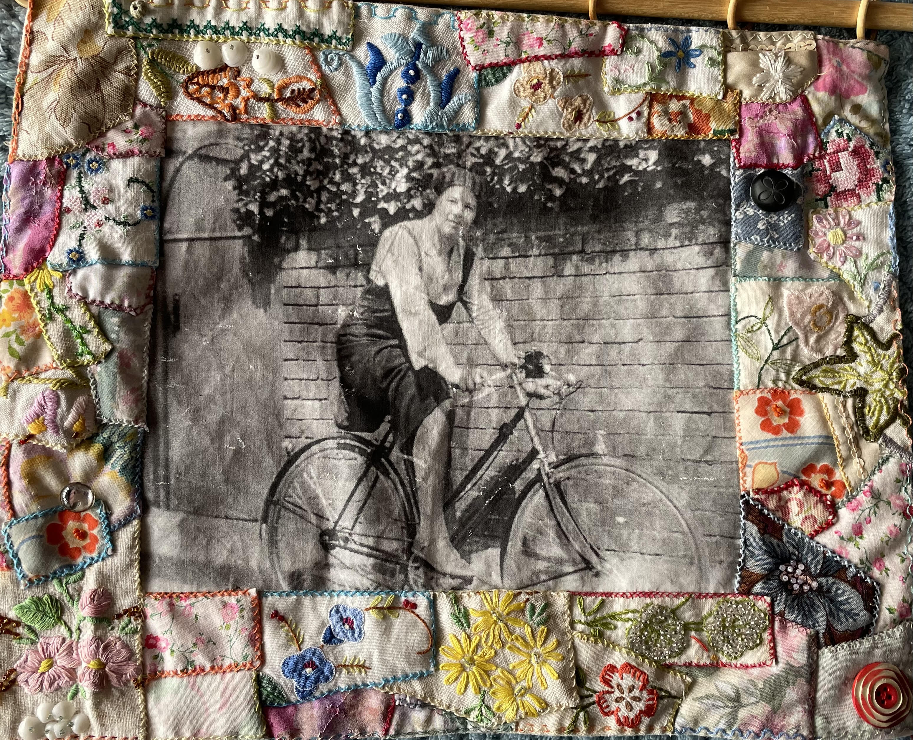 a swen collage frame surrounding a black and white photo of a woman on a bike